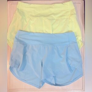 2 pairs of Lululemon “Speed up mid rise lined shorts” 4” size 8